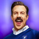 Jason Sudekis smiling as Ted Lasso