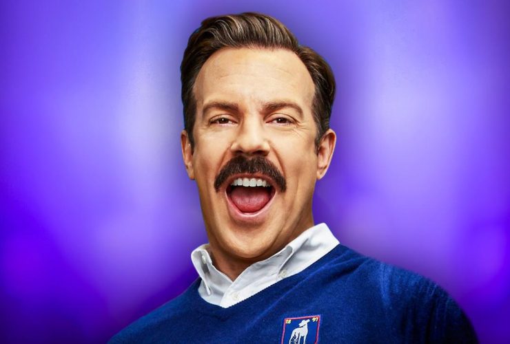 Jason Sudekis smiling as Ted Lasso